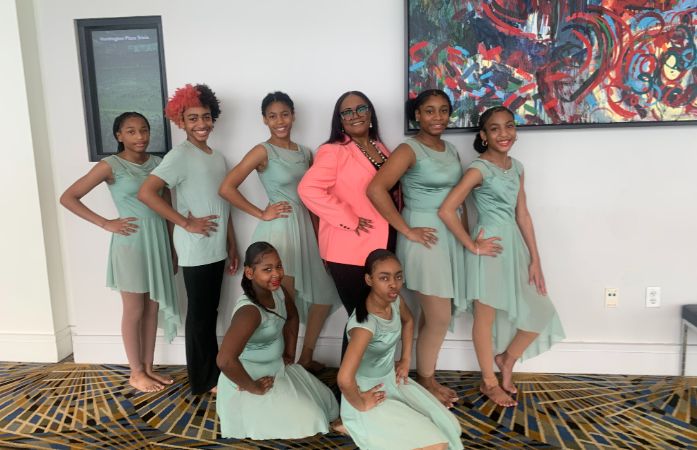  Dancers and instructor posing for photo